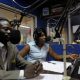 Two journalists in the Radio Okapi studio in Kinshasa, 2010. ©Credits: Fondation Hirondelle / Lam Duc Hien